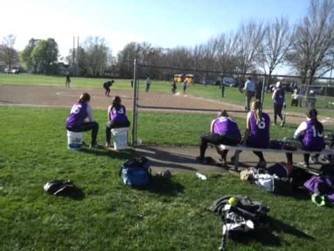 Video of Brianna Clark softball long throw third base out. 