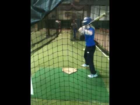 Video of 2013- Behind View of Hitting in Cage