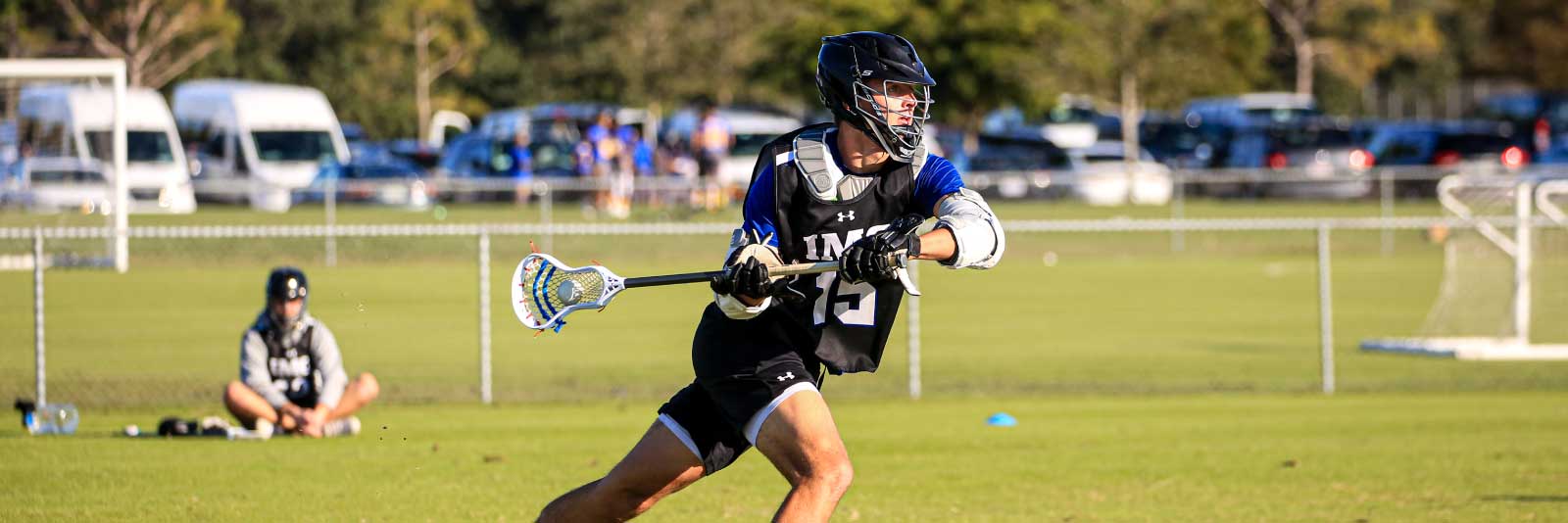 IMG male lacrosse player on field