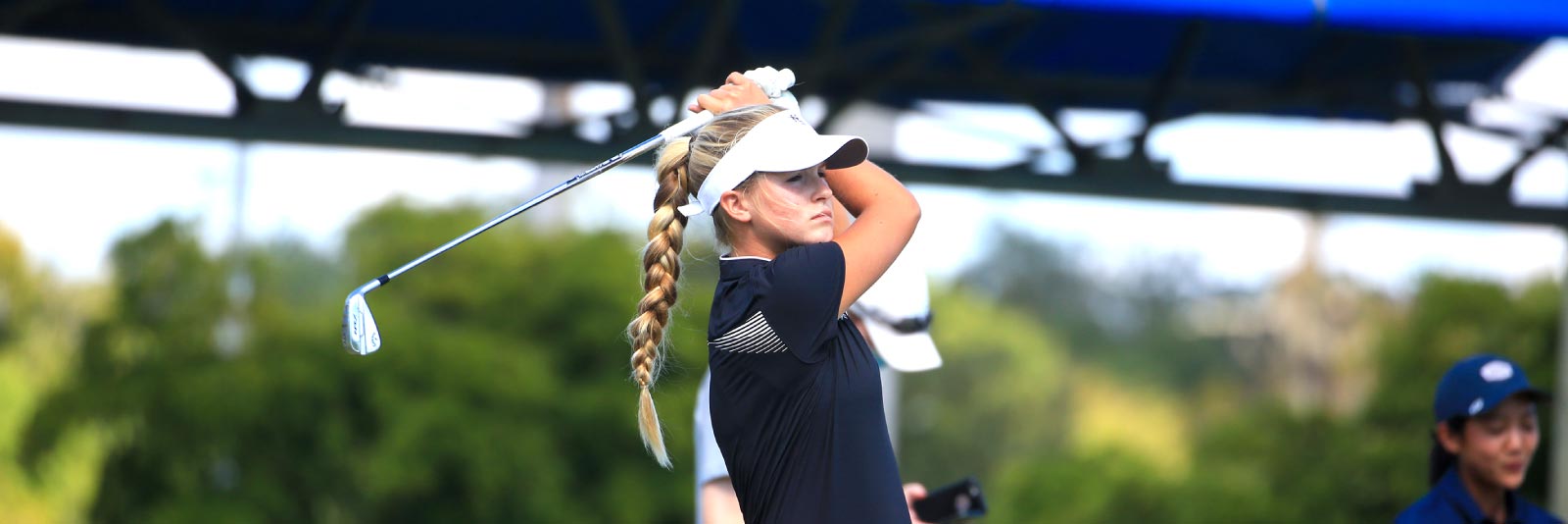 Women's golfer on the fairway